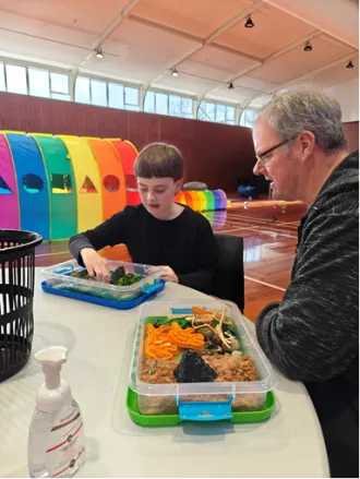 Carter and Dad Glenn during their private booked session exploring tactile play