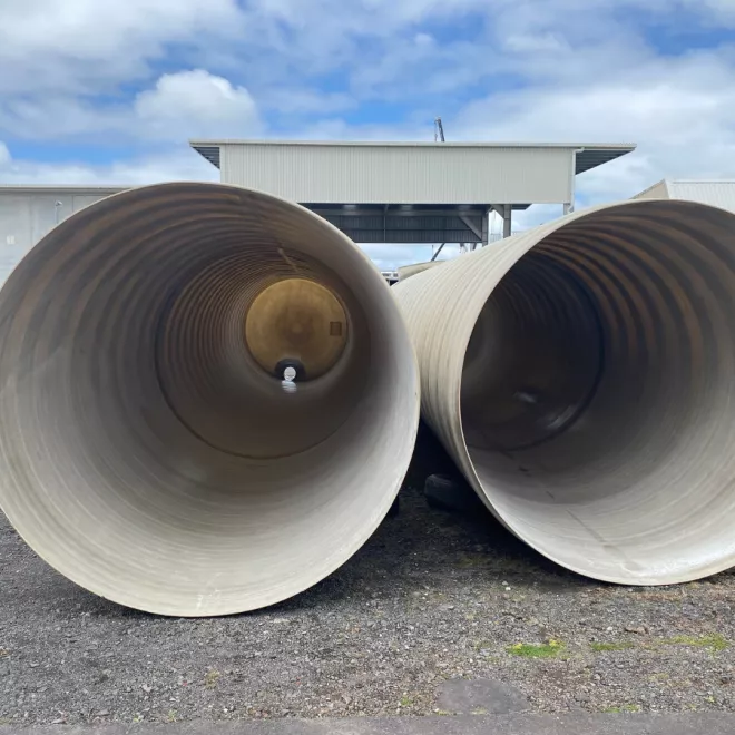 A picture of the fibreglass tanks in two parts, looking inside the structure. It's approximately the height of a person inside the tank.