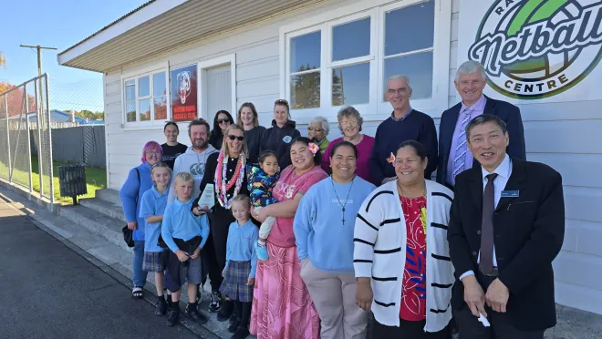 A group photo of Katie, her family, Mayor Andy and other attendees who were at the presentation of Katie's award at Centennial Park.