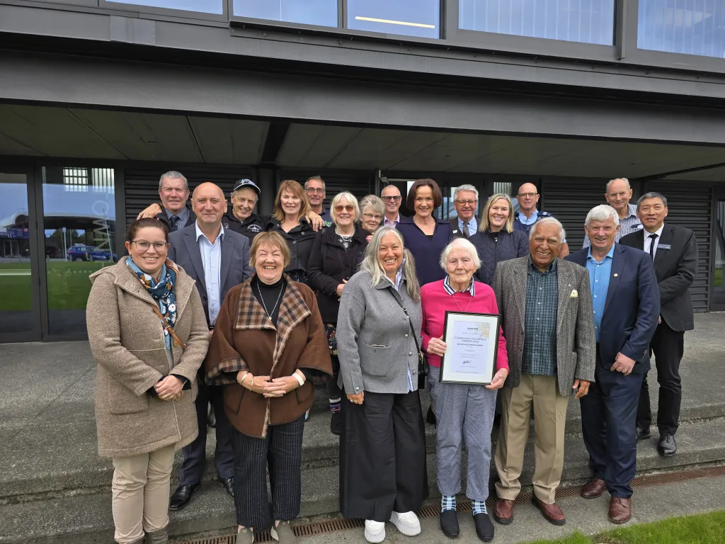 This year's Mayor's Award Winner, Jo Rangooni of Bulls, surrounded by her family, friends and colleagues following the presentation of her award by Mayor Andy Watson.